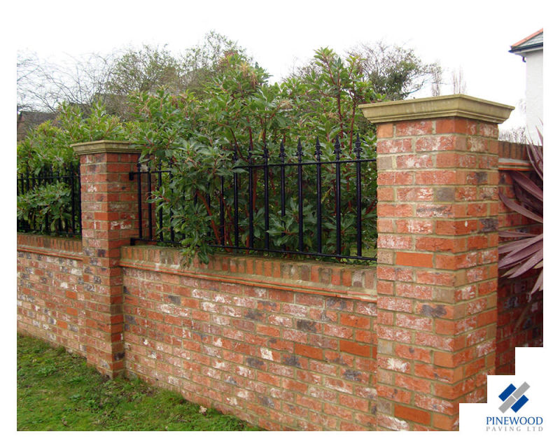 Wall, railings and sandstone pier caps